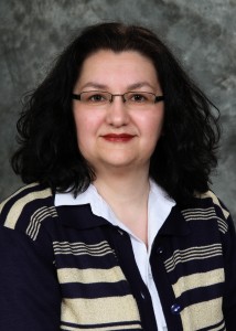 Жанета Б. Козомара- професор